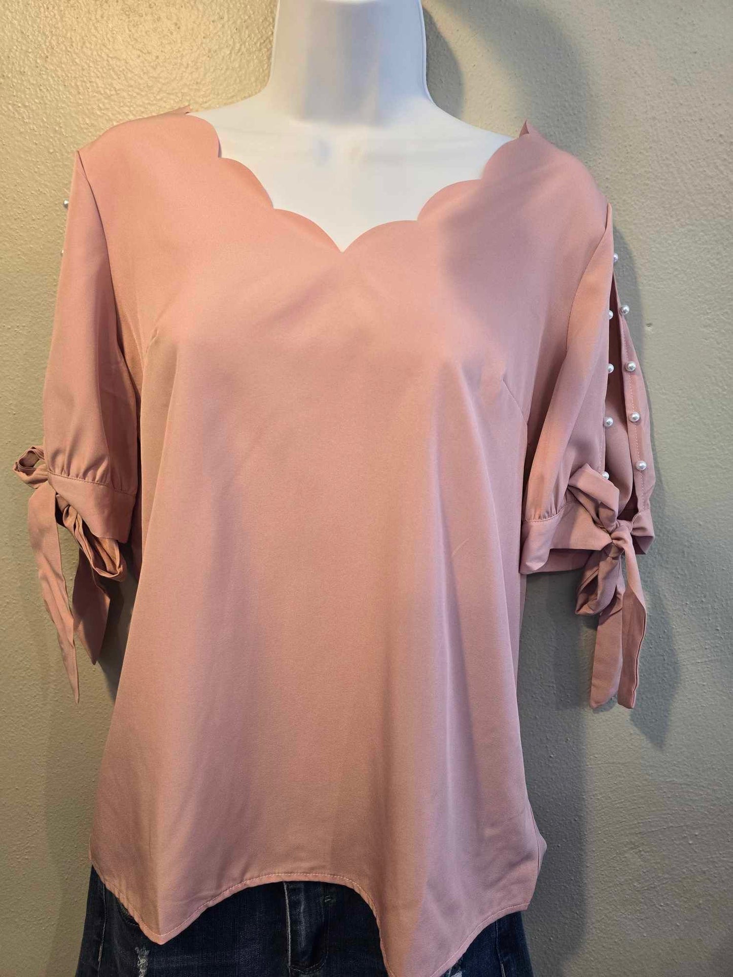 Blouse with open tie sleeves